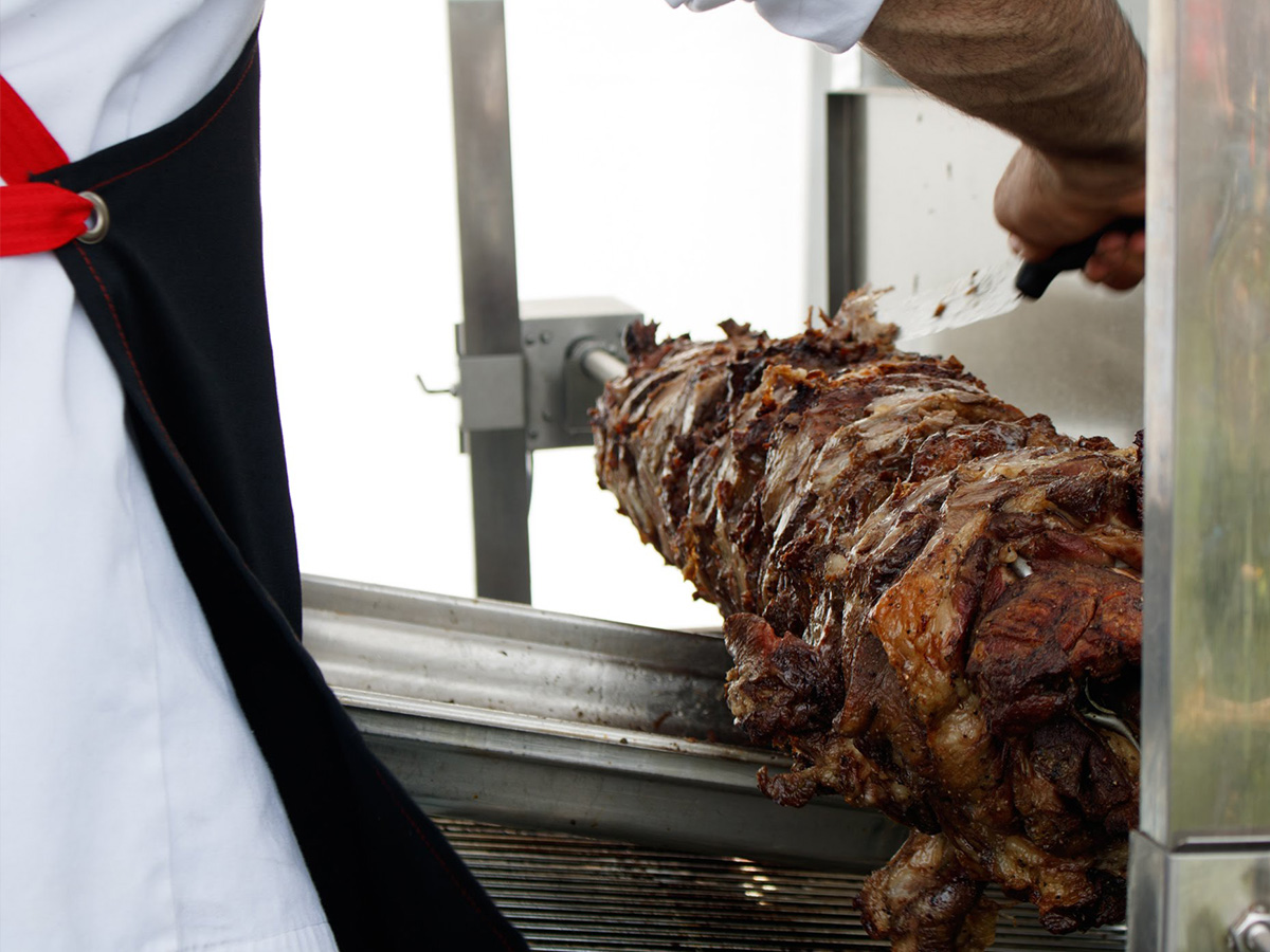 Chef Luis carving the meat